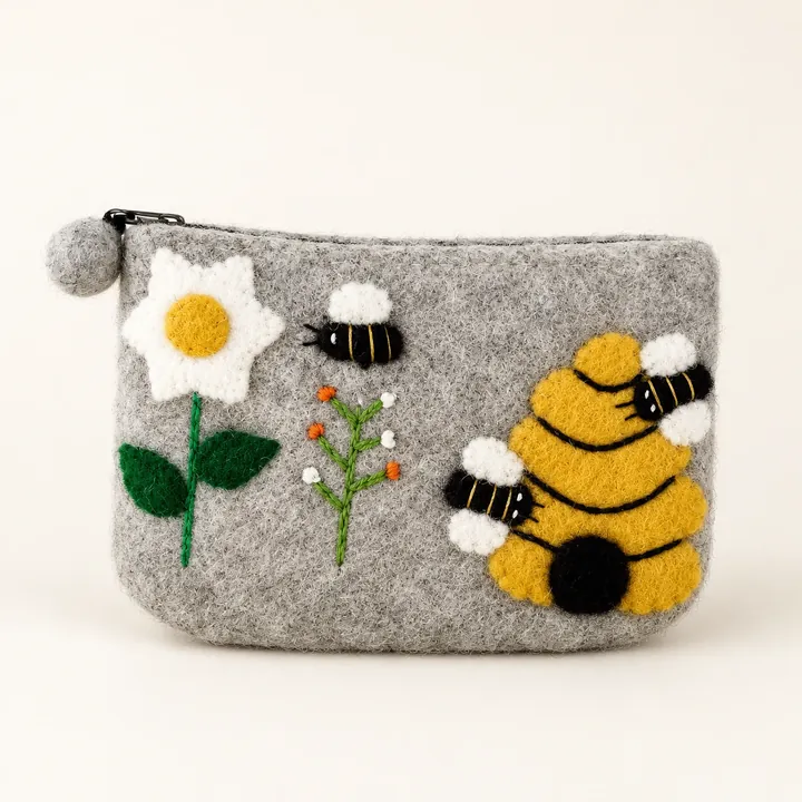 AI studio recreation: Bee garden purse in handmade wool felt on a warm ivory background