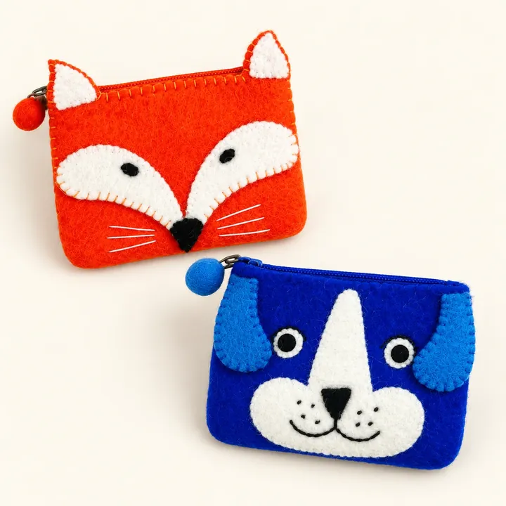 AI studio recreation: Fox & puppy purses in handmade wool felt on a warm ivory background