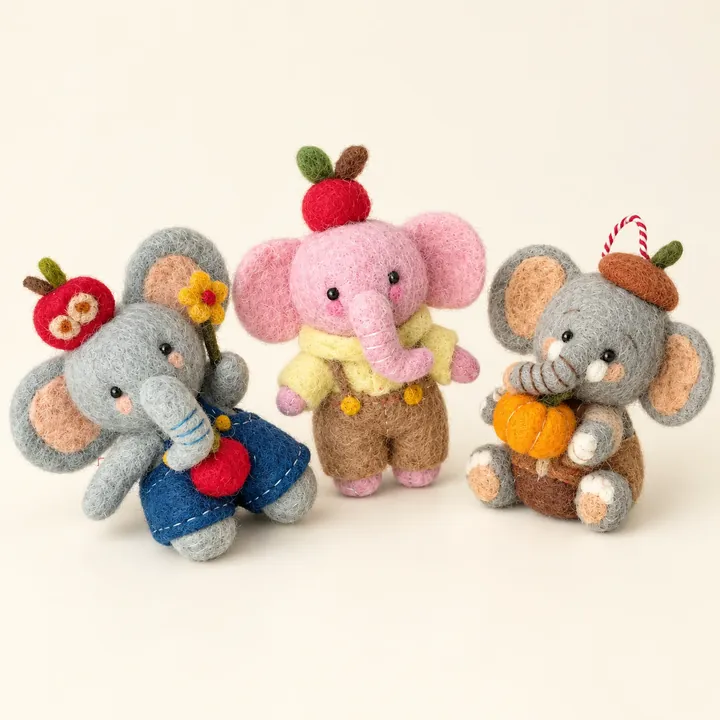 AI studio recreation: Little elephants in handmade wool felt on a warm ivory background