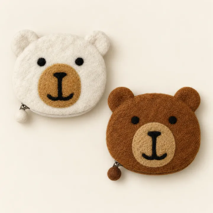 AI studio recreation: Teddy bear purses in handmade wool felt on a warm ivory background